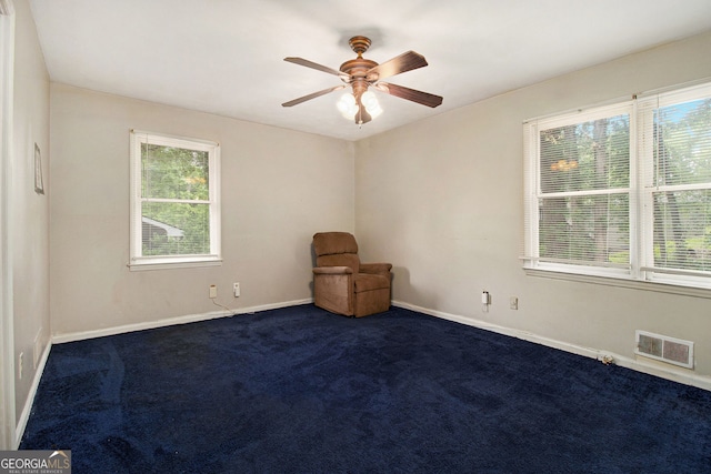 2950 Springfield Ct SW, College Park, GA 30349 - unfurnished room featuring ceiling fan, baseboards, and dark colored carpet