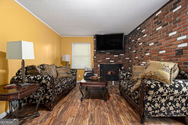 2950 Springfield Ct SW, College Park, GA 30349 - living area featuring wood finished floors, baseboards, ornamental molding, and a textured ceiling