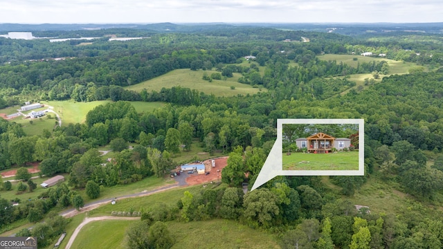 view of property location featuring a forest and property boundaries highlighted