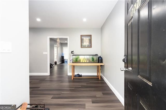 2221 Baker Carter Dr, Loganville, GA 30052 - entrance foyer featuring baseboards, wood finished floors, and recessed lighting