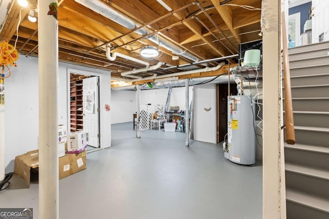 below grade area with gas water heater and stairs