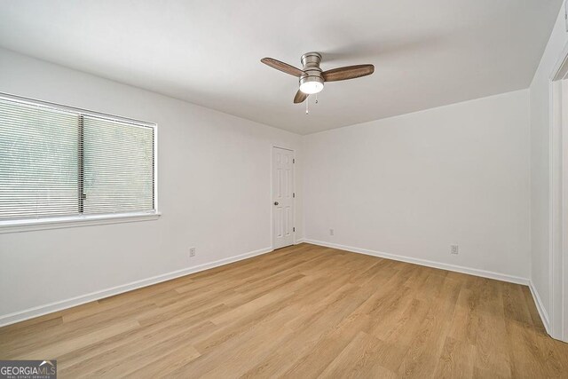 510 Northridge Crossing Dr, Sandy Springs, GA 30350 - unfurnished room with light wood-style flooring, ceiling fan, and baseboards