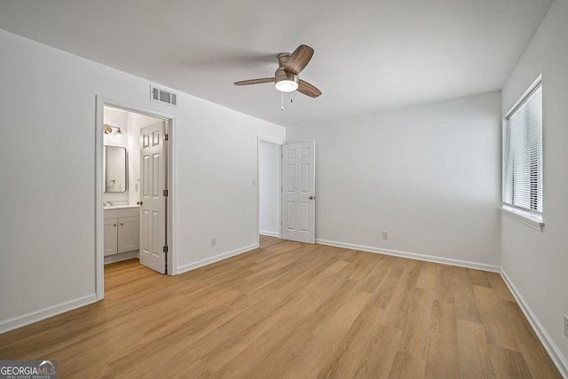 510 Northridge Crossing Dr, Sandy Springs, GA 30350 - unfurnished bedroom with light wood-type flooring, baseboards, ensuite bath, and ceiling fan