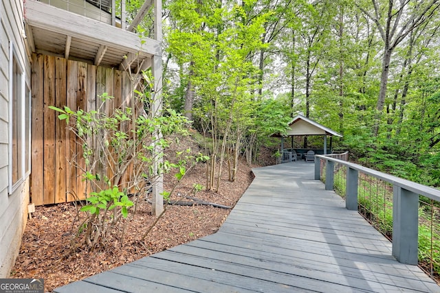 wooden deck featuring a gazebo