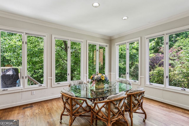 4070 Ridgehurst Dr SE, Smyrna, GA 30080 - sunroom / solarium with wood finished floors, baseboards, ornamental molding, recessed lighting, and a wooden deck