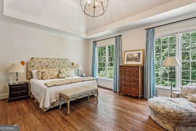4070 Ridgehurst Dr SE, Smyrna, GA 30080 - bedroom with a chandelier, dark wood-style flooring, and ornamental molding