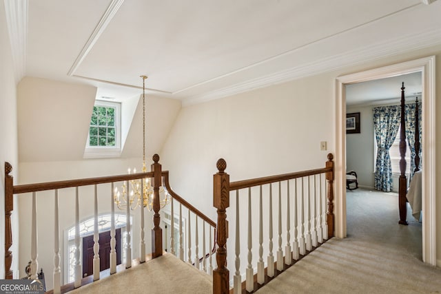 4070 Ridgehurst Dr SE, Smyrna, GA 30080 - corridor with an upstairs landing, carpet flooring, a chandelier, and ornamental molding