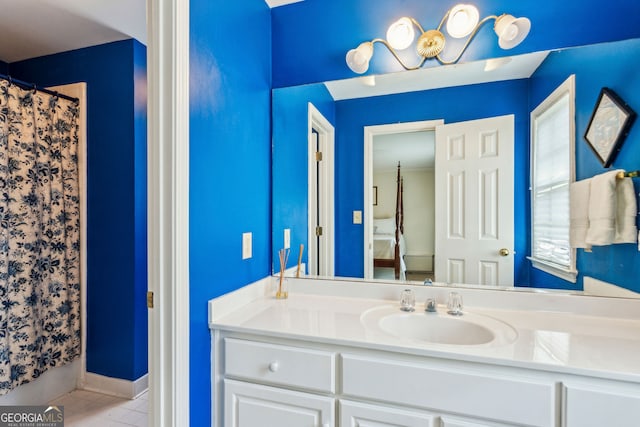 4070 Ridgehurst Dr SE, Smyrna, GA 30080 - full bath featuring tile patterned flooring, vanity, and a shower with shower curtain