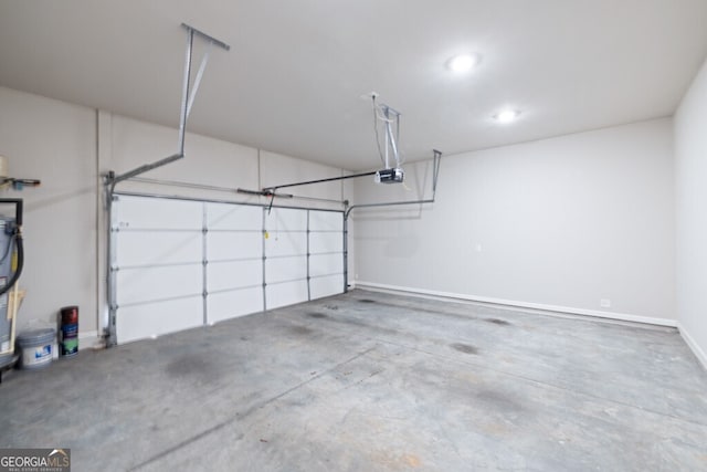 896 Farmstead Rd Unit 162, Suwanee, GA 30024 - garage with baseboards and recessed lighting