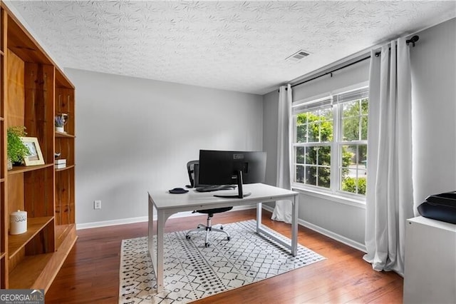 411 Sugar Maple Ct, Canton, GA 30114 - home office with wood finished floors, baseboards, and a textured ceiling