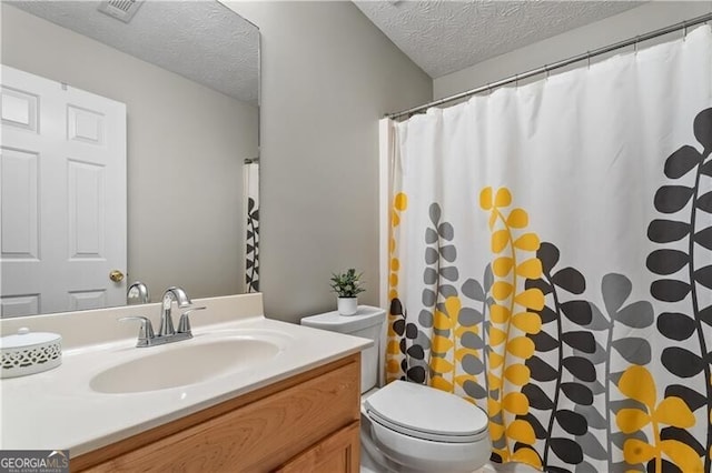 411 Sugar Maple Ct, Canton, GA 30114 - bathroom with a textured ceiling, toilet, vanity, and curtained shower
