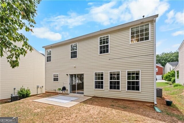 411 Sugar Maple Ct, Canton, GA 30114 - rear view of property featuring a patio, a yard, and cooling unit