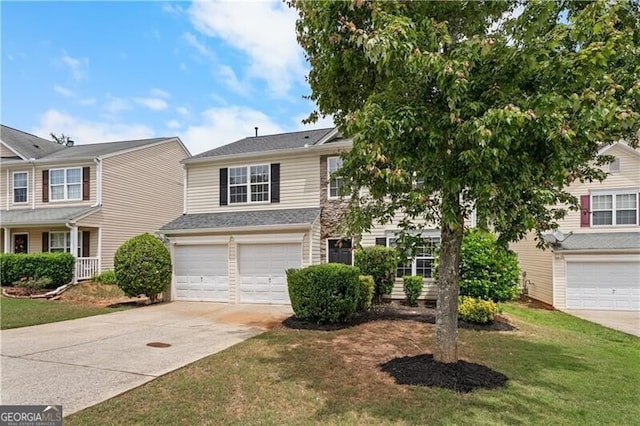 411 Sugar Maple Ct, Canton, GA 30114 - view of front of property with driveway, an attached garage, and a front lawn
