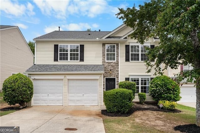 411 Sugar Maple Ct, Canton, GA 30114 - view of front of property featuring concrete driveway, a garage, and a shingled roof