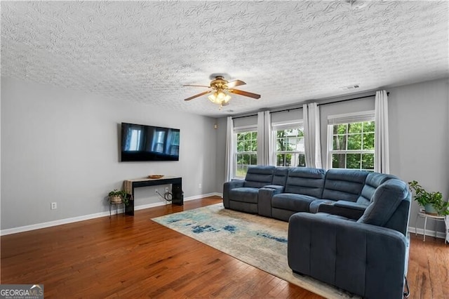 411 Sugar Maple Ct, Canton, GA 30114 - living room with ceiling fan, a textured ceiling, baseboards, and wood finished floors