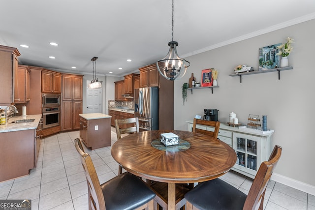 1610 Turtle Pond Dr, Hoschton, GA 30548 - dining area with light tile patterned floors, recessed lighting, a chandelier, and ornamental molding