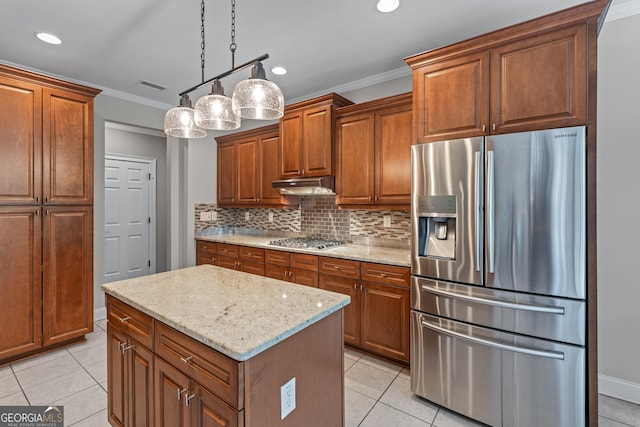1610 Turtle Pond Dr, Hoschton, GA 30548 - kitchen with stainless steel appliances, ornamental molding, light tile patterned floors, tasteful backsplash, and under cabinet range hood