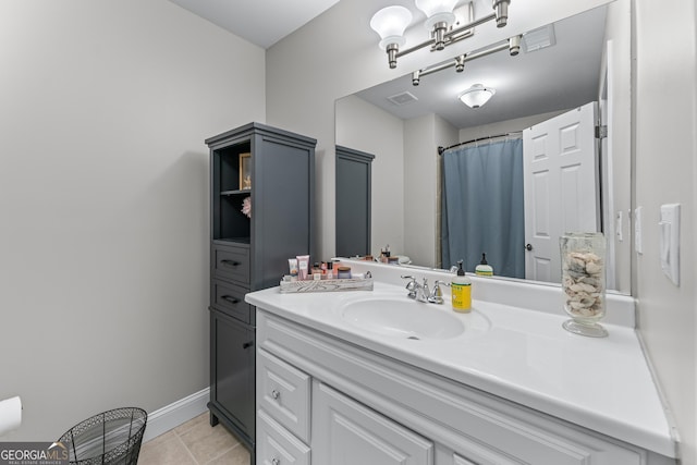 1610 Turtle Pond Dr, Hoschton, GA 30548 - full bathroom with vanity, tile patterned flooring, a chandelier, and a shower with shower curtain