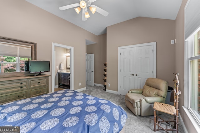 1610 Turtle Pond Dr, Hoschton, GA 30548 - bedroom featuring vaulted ceiling, light carpet, a closet, ceiling fan, and connected bathroom