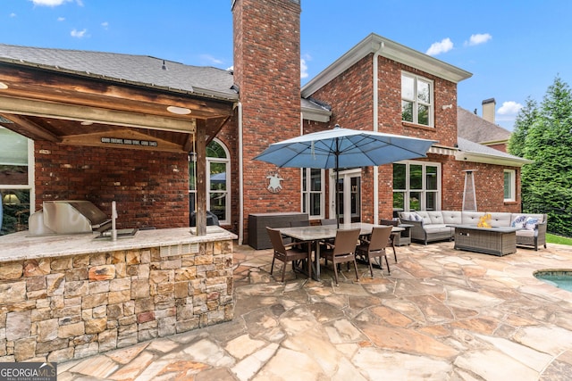 1610 Turtle Pond Dr, Hoschton, GA 30548 - view of patio featuring an outdoor living space, area for grilling, and outdoor dining area