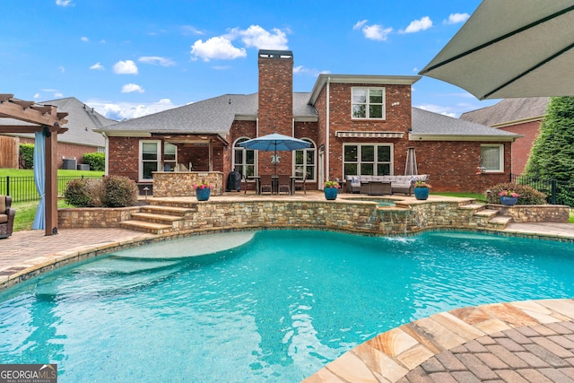 1610 Turtle Pond Dr, Hoschton, GA 30548 - view of swimming pool featuring outdoor lounge area, a patio area, a pool with connected hot tub, and outdoor dining space