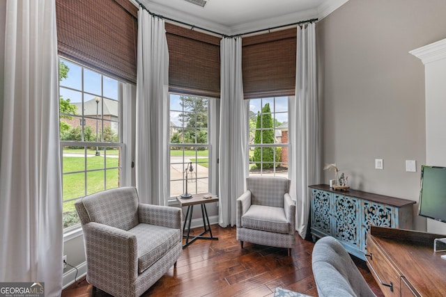 1610 Turtle Pond Dr, Hoschton, GA 30548 - sitting room featuring plenty of natural light, dark wood finished floors, and crown molding