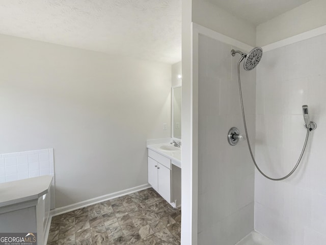 727 Overlook Crst, Monroe, GA 30655 - bathroom featuring vanity and a tile shower
