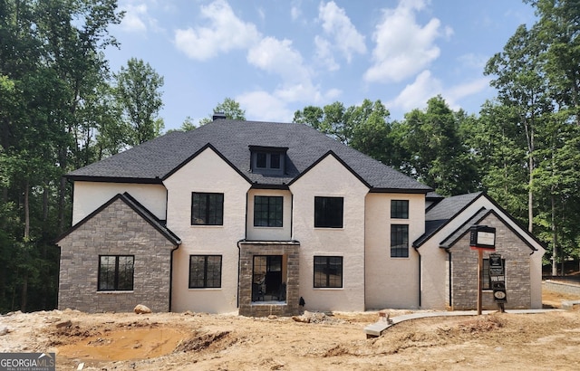 241 Traditions Dr, Alpharetta, GA 30004 - french provincial home featuring stone siding