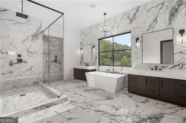241 Traditions Dr, Alpharetta, GA 30004 - full bath featuring stone wall, marble tiled flooring, a marble finish shower, and tile walls