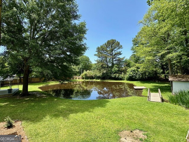 485 Angham Rd, Hiram, GA 30141 - bathroom with washtub / shower combination, vanity, and tile patterned floors