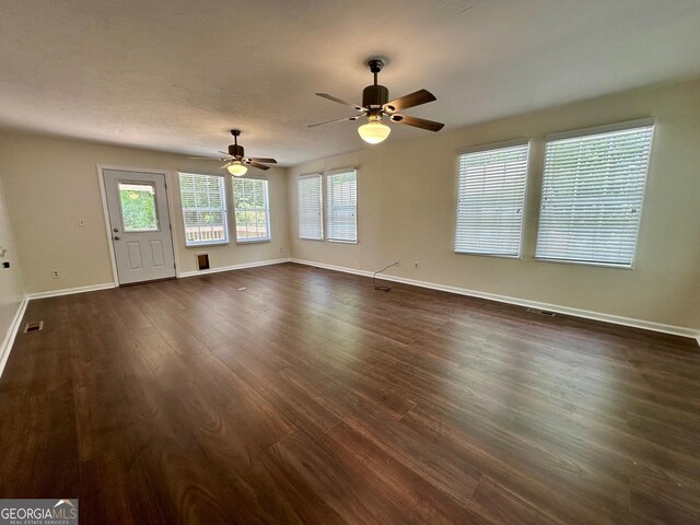 485 Angham Rd, Hiram, GA 30141 - kitchen featuring appliances with stainless steel finishes, dark wood-type flooring, white cabinetry, light stone counters, and decorative backsplash