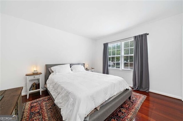 52 Chaumont Sq NW, Atlanta, GA 30327 - bedroom with wood finished floors and baseboards