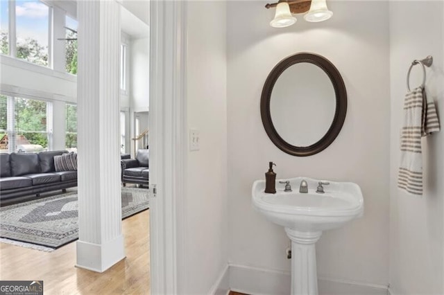 1029 Ector Dr NW, Kennesaw, GA 30152 - bathroom with baseboards and wood finished floors