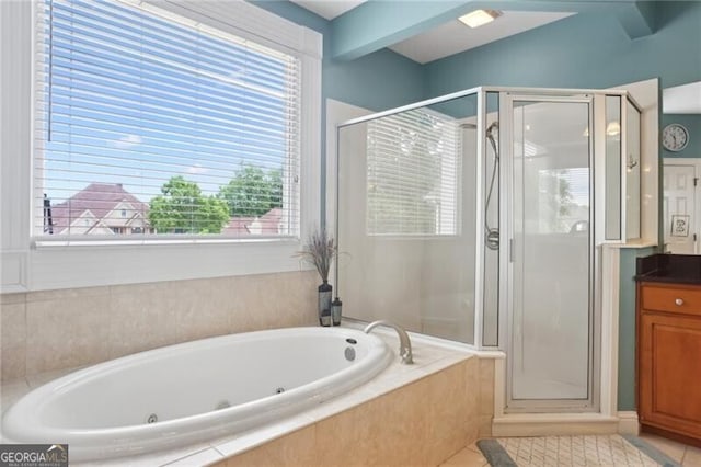 1029 Ector Dr NW, Kennesaw, GA 30152 - full bath with a shower stall, a whirlpool tub, vanity, and tile patterned floors