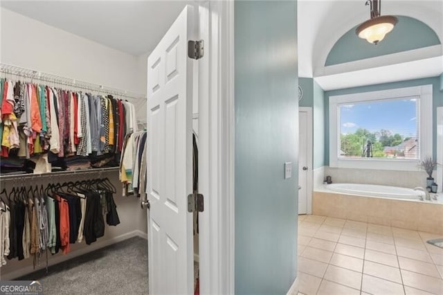 1029 Ector Dr NW, Kennesaw, GA 30152 - walk in closet with tile patterned floors