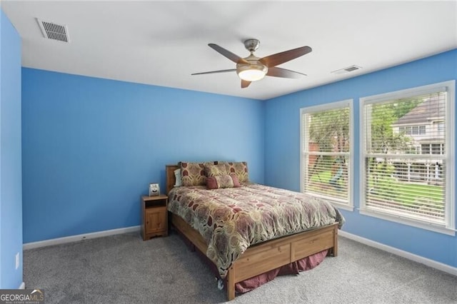 1029 Ector Dr NW, Kennesaw, GA 30152 - bedroom featuring baseboards, carpet floors, and ceiling fan