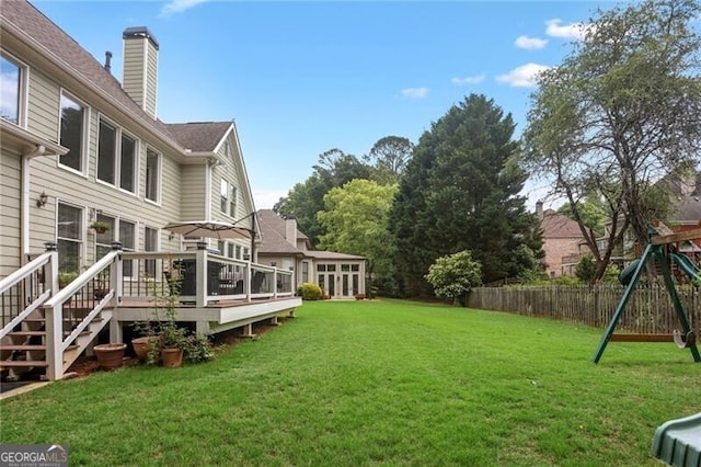 1029 Ector Dr NW, Kennesaw, GA 30152 - view of yard with a deck and a playground