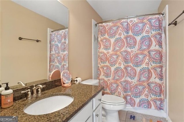1029 Ector Dr NW, Kennesaw, GA 30152 - bathroom featuring toilet, vanity, a shower with curtain, and tile patterned flooring