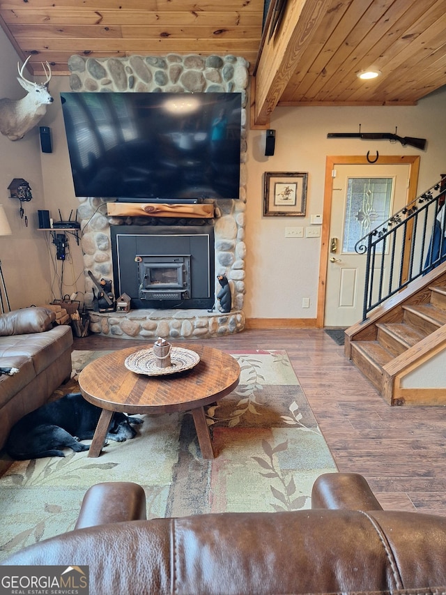 601 Colquitt Rd, Cedartown, GA 30125 - living room with wooden ceiling, wood finished floors, a fireplace, stairway, and baseboards