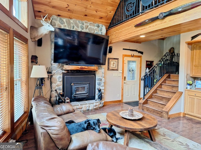 601 Colquitt Rd, Cedartown, GA 30125 - living room featuring lofted ceiling, wood finished floors, wooden ceiling, stairs, and baseboards