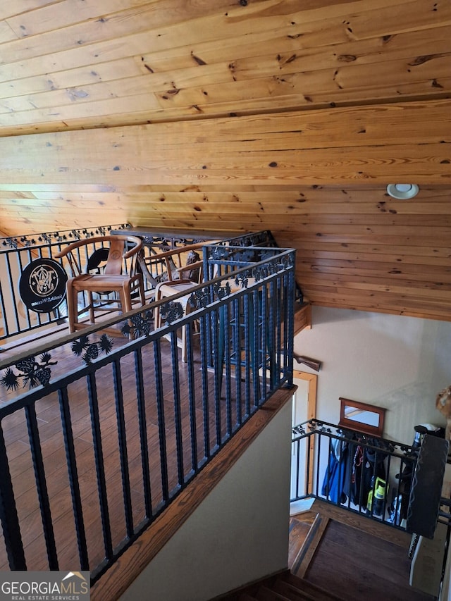 staircase featuring wooden ceiling