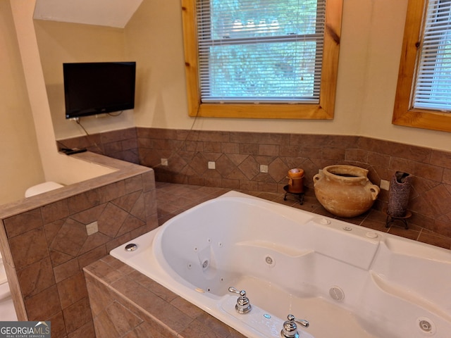 bathroom featuring a whirlpool tub