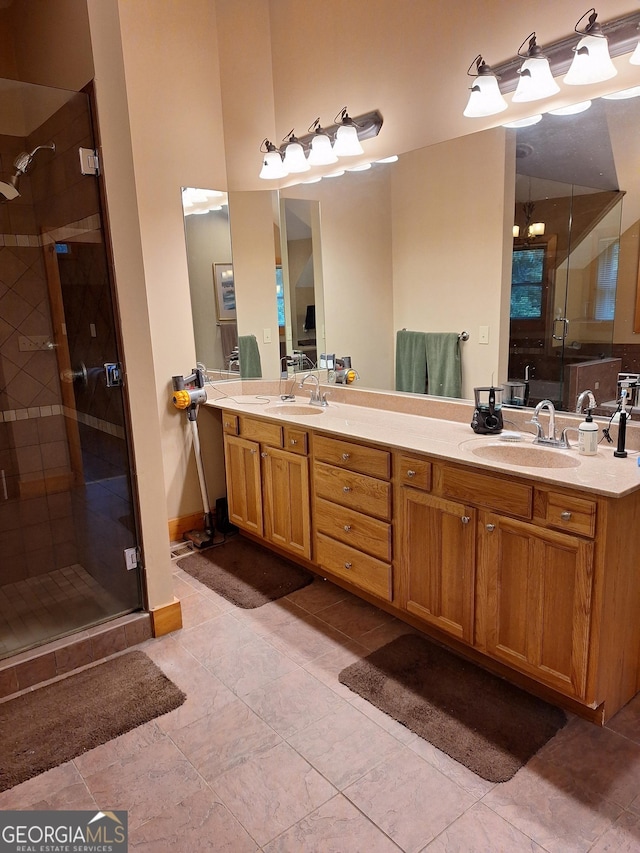 601 Colquitt Rd, Cedartown, GA 30125 - bathroom featuring a stall shower, double vanity, and tile patterned flooring