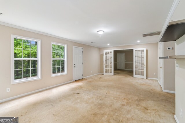 111 Trellis Ct, Acworth, GA 30101 - unfurnished living room featuring french doors, ornamental molding, baseboards, carpet floors, and recessed lighting