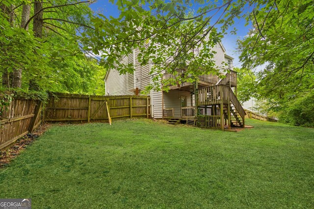 111 Trellis Ct, Acworth, GA 30101 - view of yard with a deck and stairs