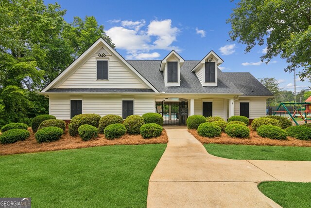 111 Trellis Ct, Acworth, GA 30101 - new england style home with a playground and roof with shingles