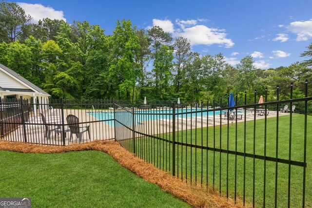 111 Trellis Ct, Acworth, GA 30101 - community pool featuring a patio