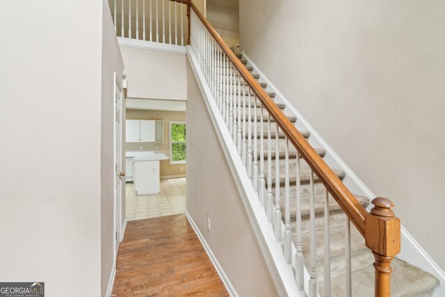 111 Trellis Ct, Acworth, GA 30101 - stairs with wood finished floors and baseboards