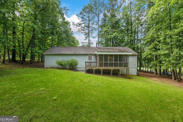 1154 Pinebrook Rd, Auburn, GA 30011 - rear view of property featuring a sunroom and a lawn
