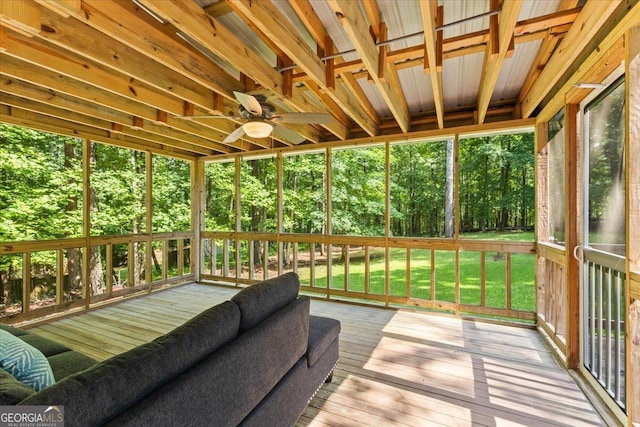 1154 Pinebrook Rd, Auburn, GA 30011 - sunroom / solarium featuring ceiling fan and view of scattered trees